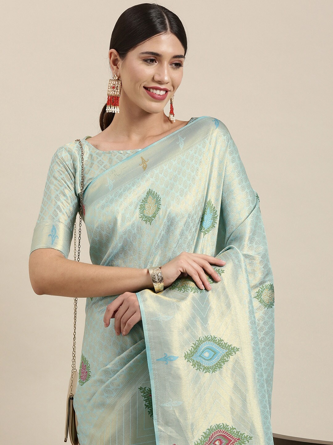 

Mitera Blue & Gold Ethnic Motifs Zari Silk Blend Saree
