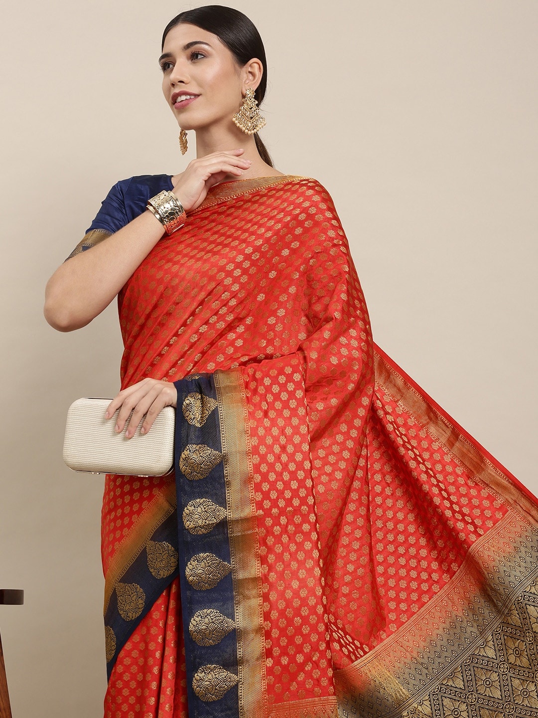 

Mitera Red & Gold Ethnic Motifs Zari Silk Blend Saree