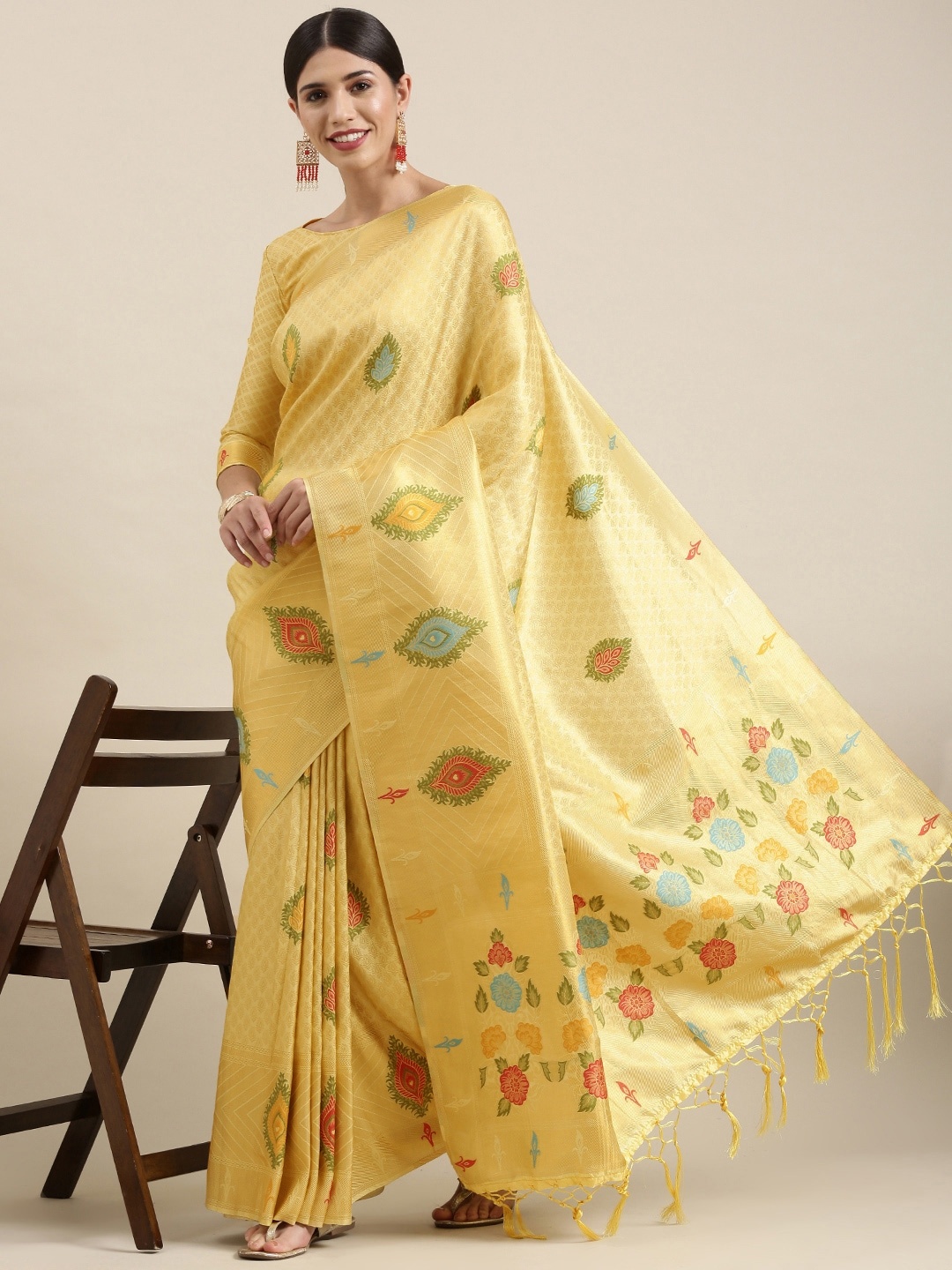 

Mitera Yellow & Gold Ethnic Motifs Zari Silk Blend Saree