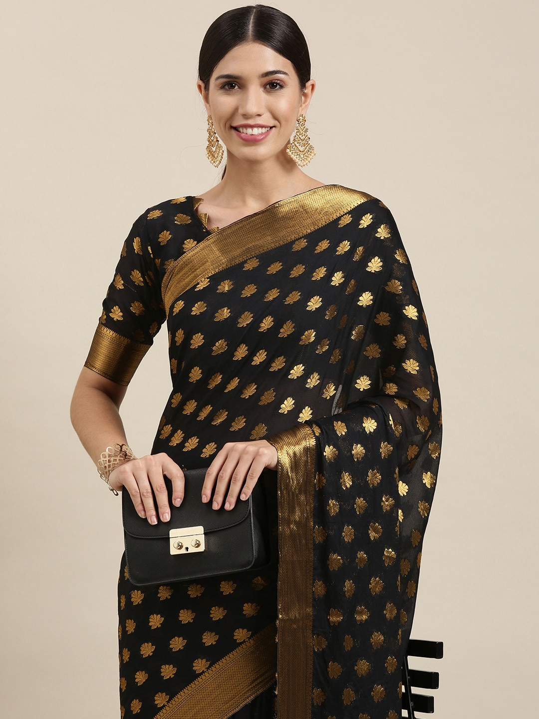

Mitera Black & Gold Ethnic Motifs Zari Silk Blend Saree