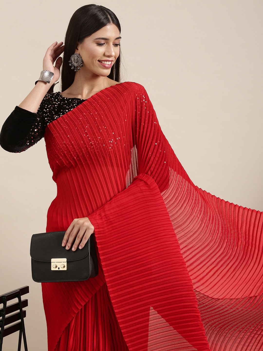 

Mitera Red Solid Pleated Sequinned Saree