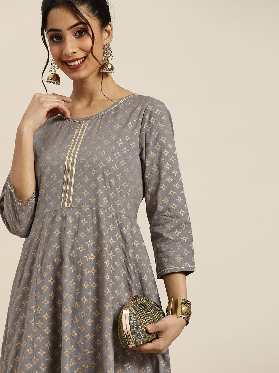 

Sangria Women Grey & Gold Ethnic Motifs Printed Gotta Patti Panalled Anarkali Kurta