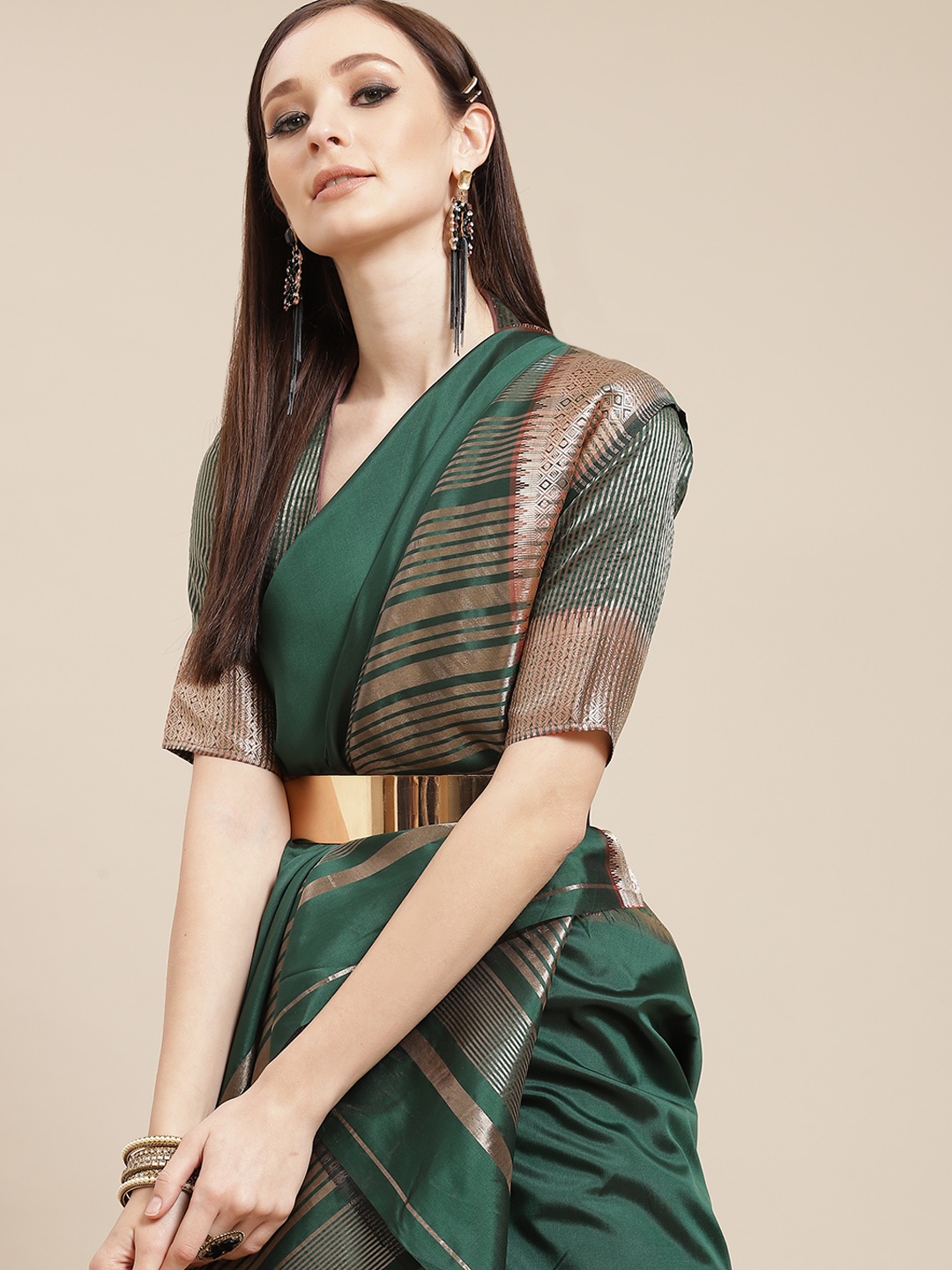 

KALINI Women Green & Golden Solid Saree