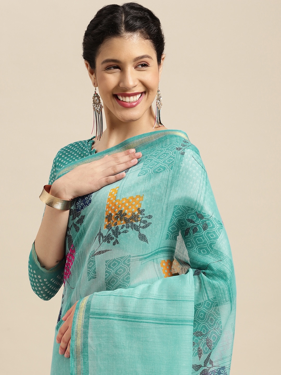

KALINI Blue & Mustard Floral Zari Saree