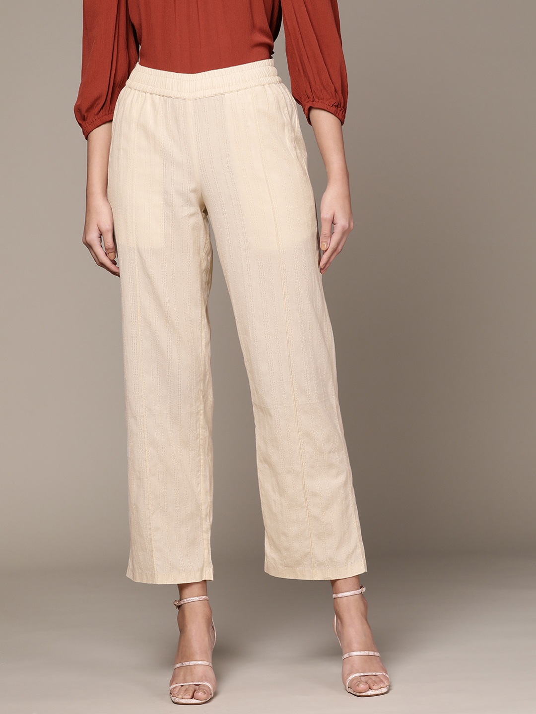 

Ritu Kumar Women Beige Textured Straight Palazzo