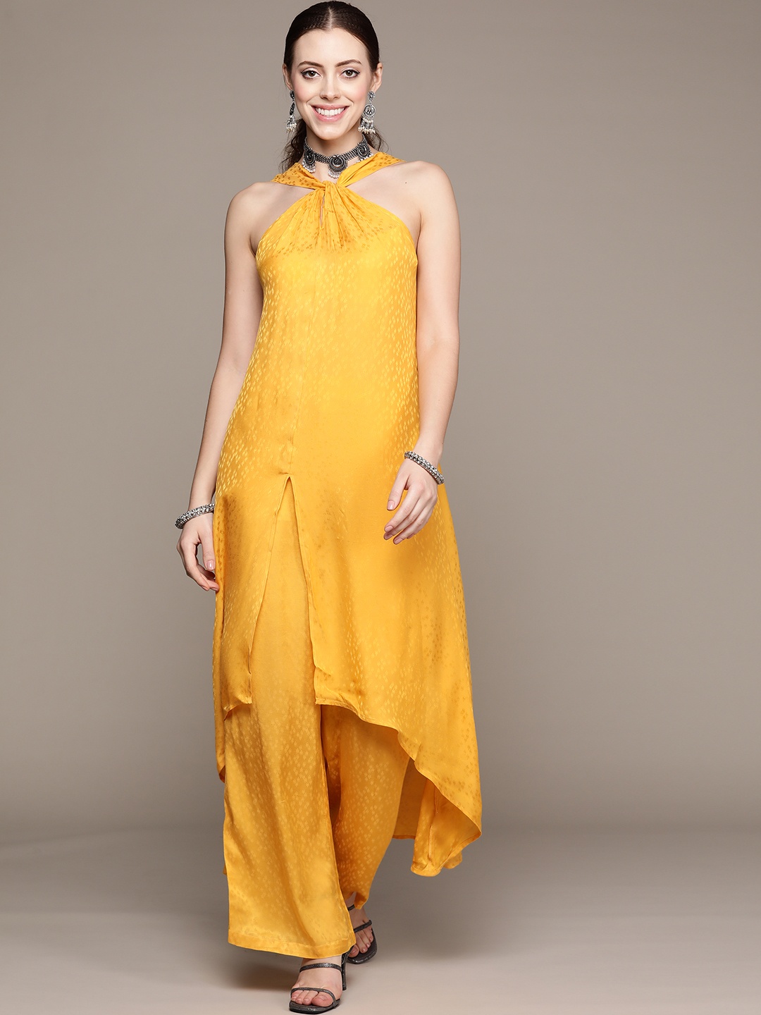 

Ritu Kumar Women Yellow Halter Neck Kurta with Palazzos