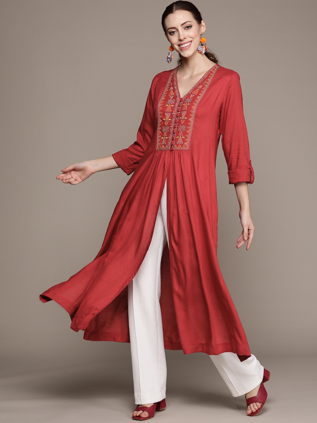 

Ritu Kumar Women Rust Red Ethnic Motifs Embroidered Yoke Design A-Line Kurta