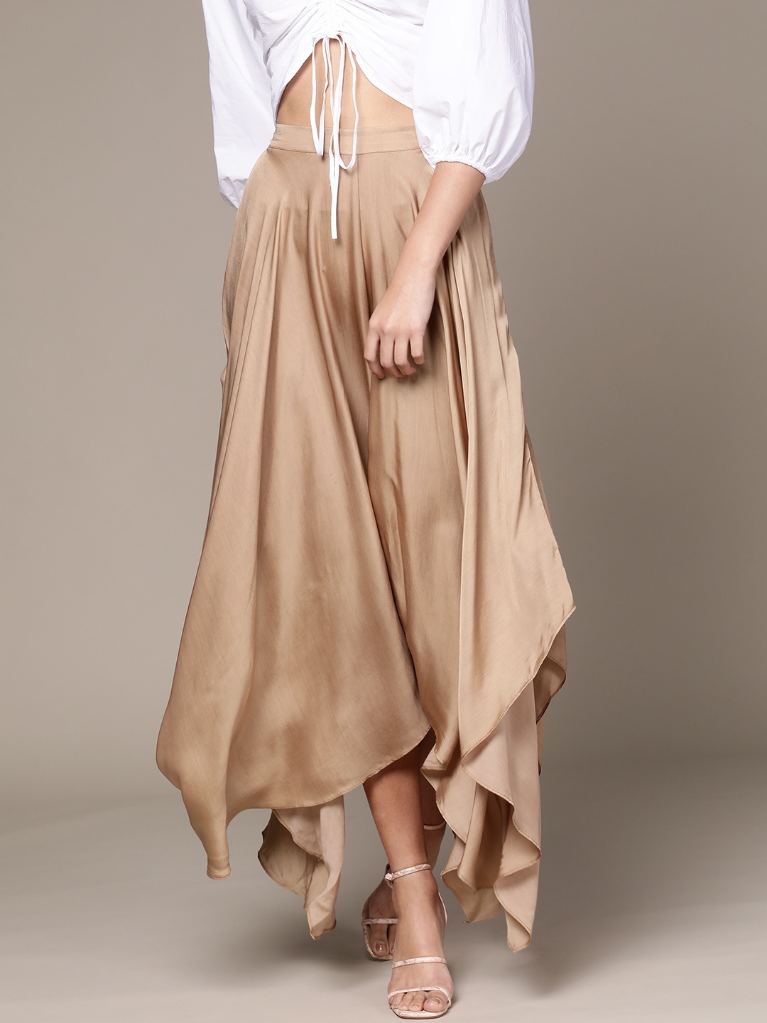 

Ritu Kumar Women Beige Solid Flared Satin Palazzos