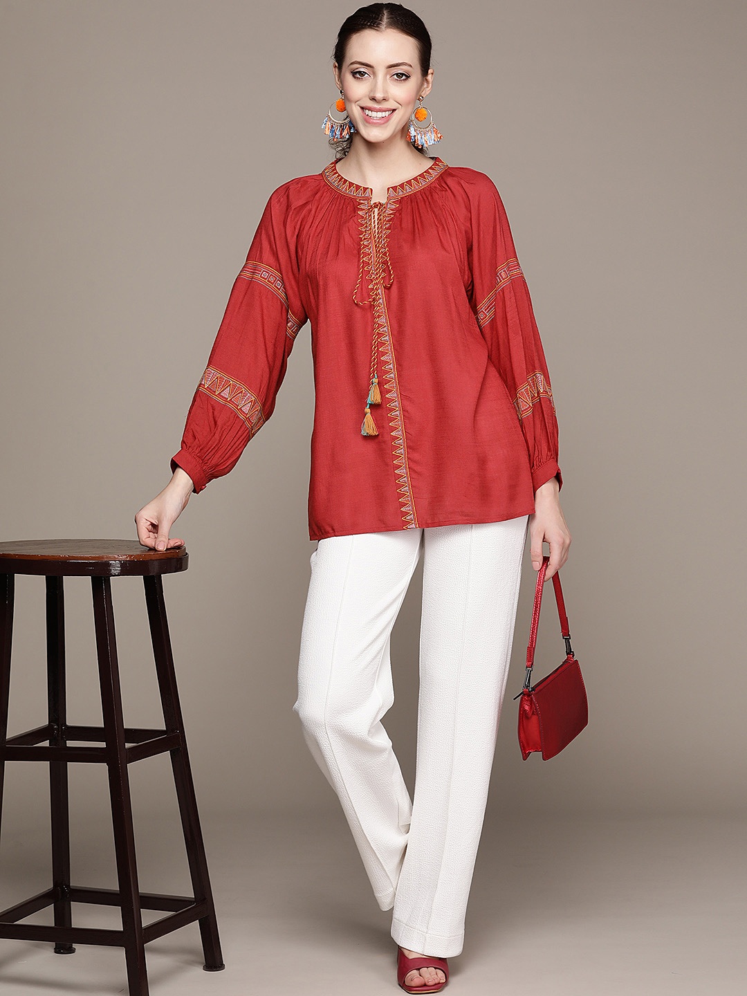 

Ritu Kumar Women Rust Red Geometric Woven Design Kurti