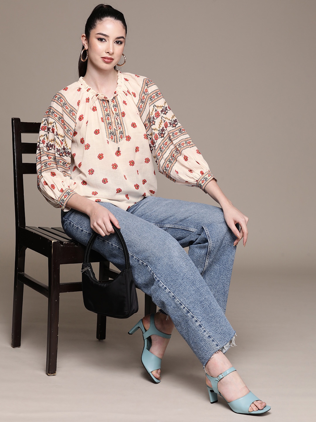 

Label Ritu Kumar Beige & Red Floral Print Tie-Up Neck Cuffed Sleeves Pleated Regular Top