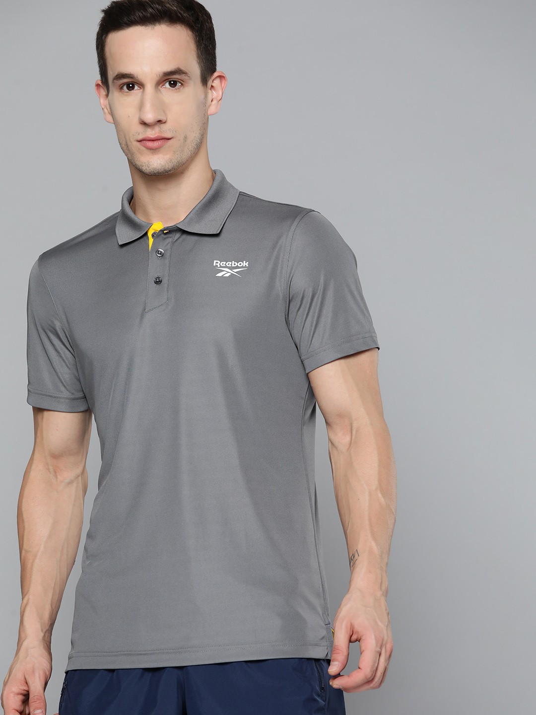 

Reebok Men Grey Solid Speedwick Training Polo Collar T-shirt