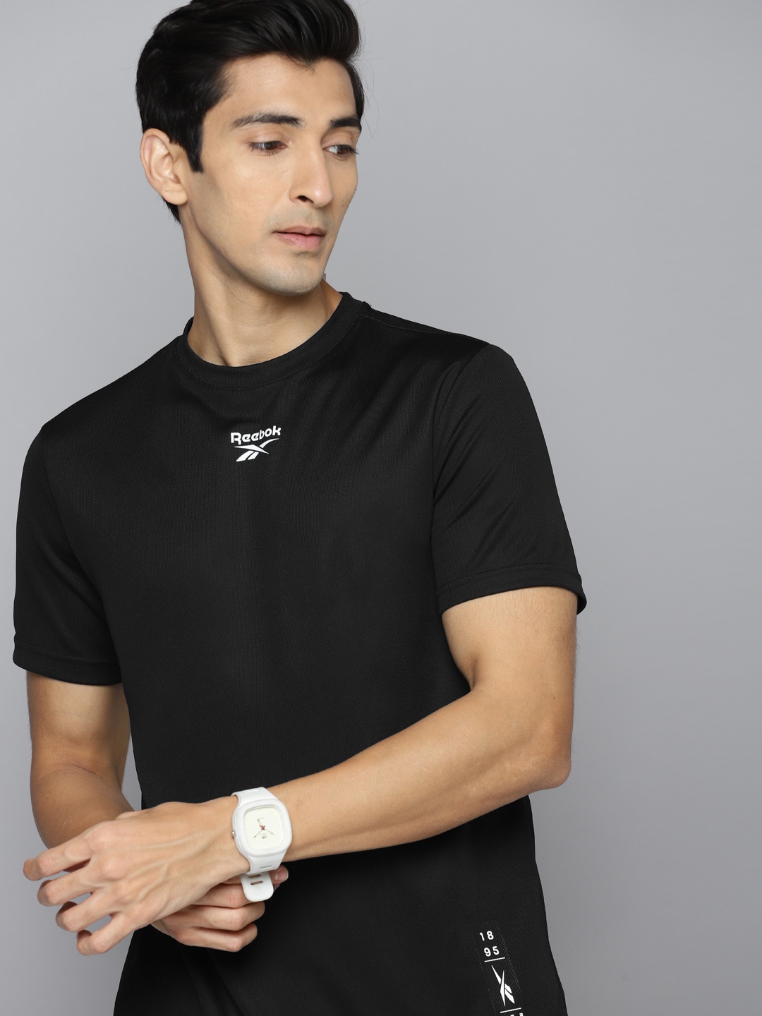 

Reebok Men Black Graphic Brand Logo Printed Slim Fit Speedwick Training T-shirt