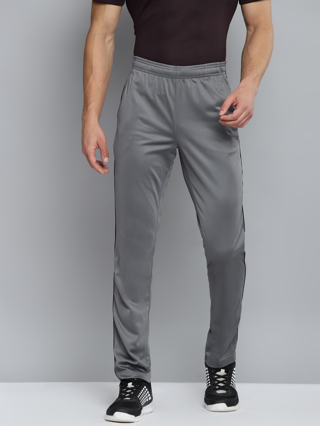 

Reebok Men Charcoal Grey Solid Neo Speedwick Track Pants