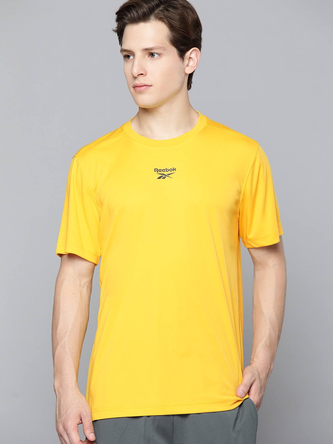 

Reebok Men Yellow Speedwick Technology Training or Gym T-shirt