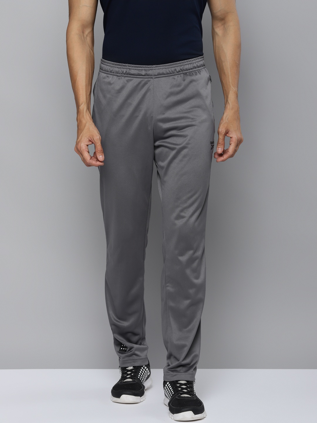 

Reebok Men Grey Solid Performance Speedwick Track Pants