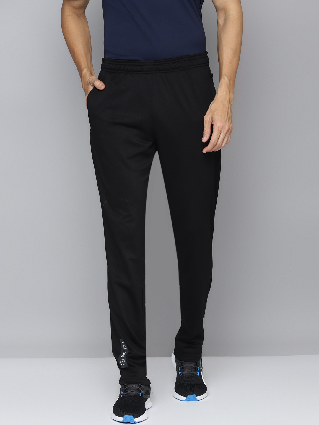 

Reebok Men Black Performance Solid Speedwick Training Track Pant