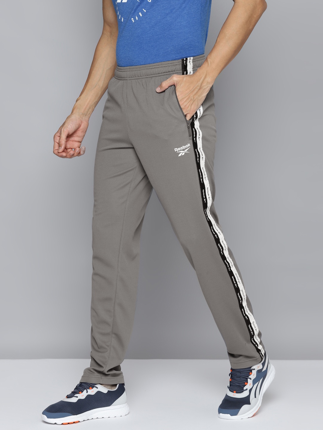 

Reebok Men Grey Self Design WF Speedwick Track Pants with Taping Detail