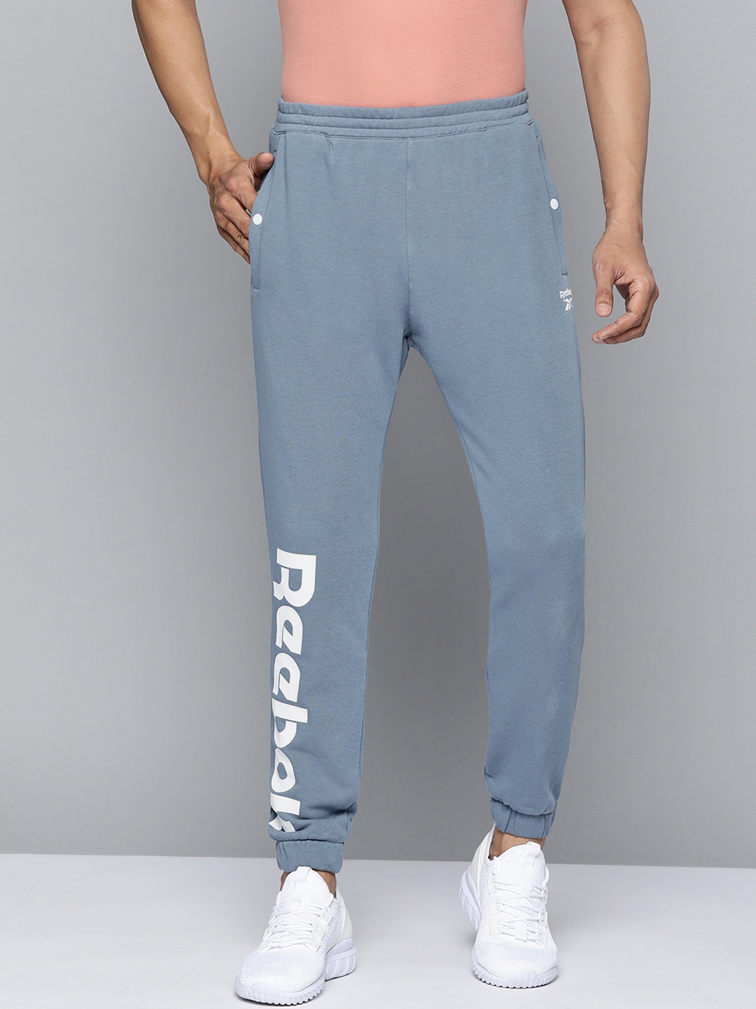 

Reebok Classic Men Blue Solid Brand Logo Printed Joggers