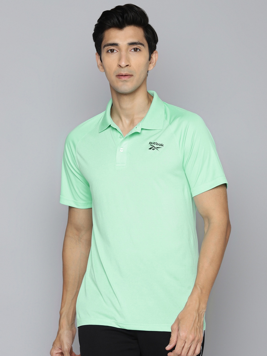 

Reebok Men Green CT Training Solid Speedwick Polo Collar T-shirt