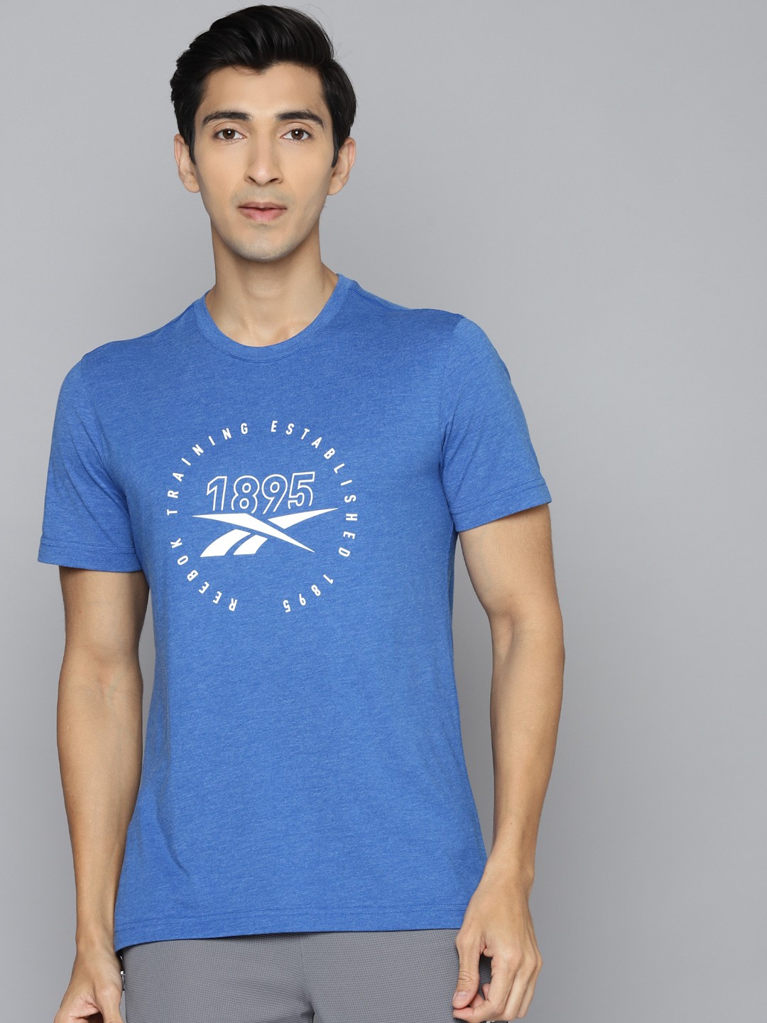 

Reebok Men Blue & White Typography Printed Slim Fit Training Workout T-shirt