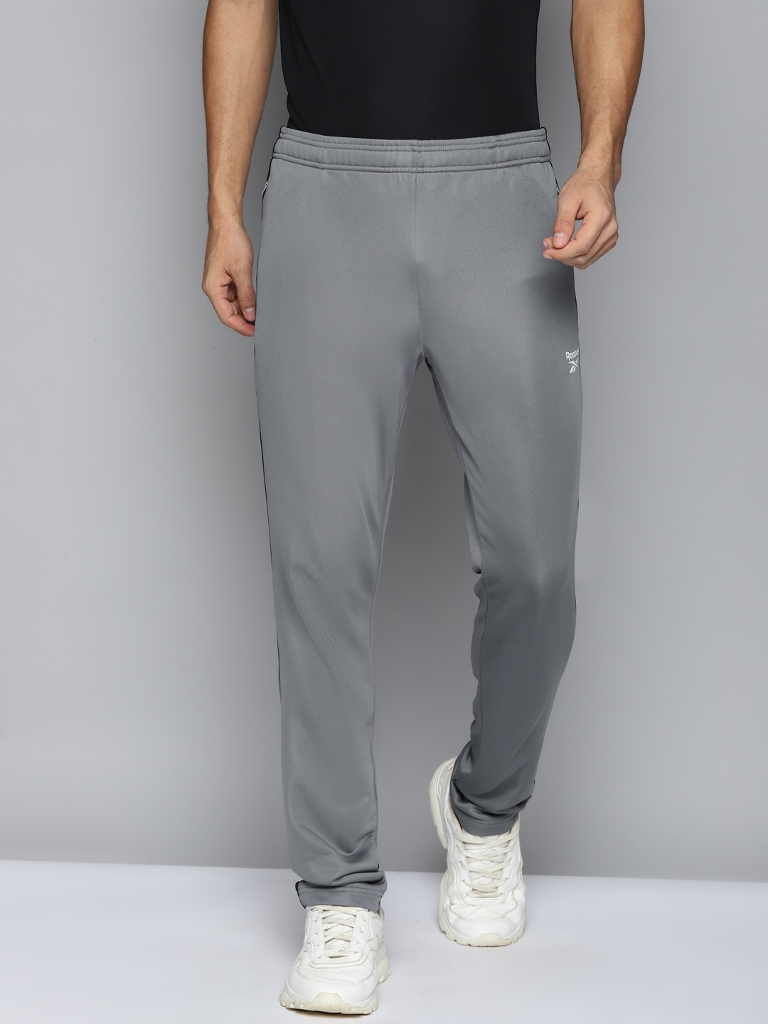 

Reebok Men Grey Vector Solid Training Track Pants