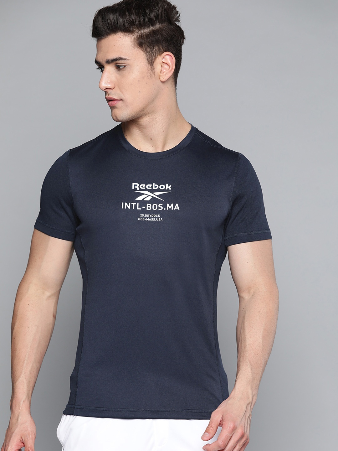 

Reebok Men Navy Blue Prime Brand Logo Print Sustainable Speedwick Training T-shirt