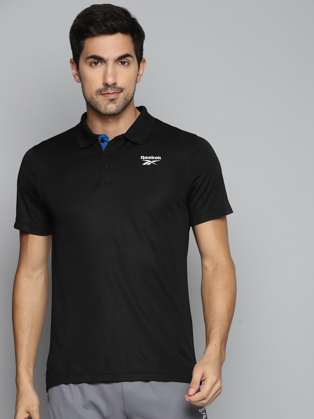 

Reebok Men Black FND Vector Solid Polo Collar Training T-shirt