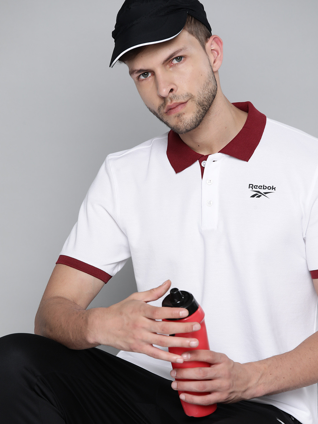 

Reebok Men White FND Solid Polo Collar Training T-shirt