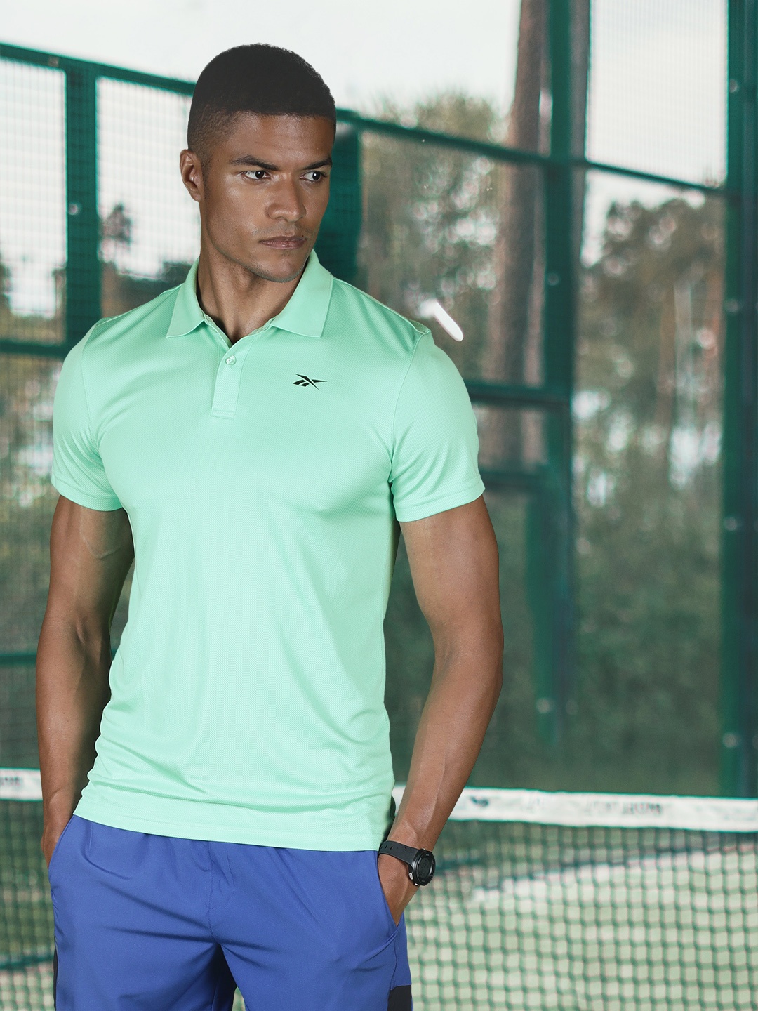 

Reebok Men Sea Green Power Mesh Polo Training RBK- SPEEDWICK T-Shirt