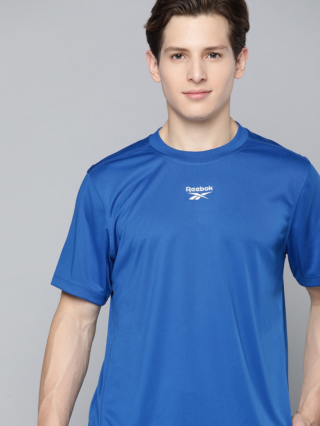 

Reebok Men Blue Solid Speedwick Technology Training or Gym T-shirt