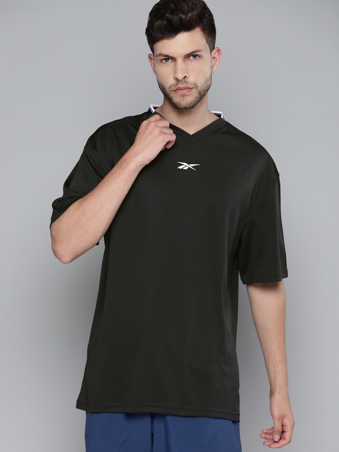 

Reebok Men Black WOR Mesh SS Solid Relaxed Fit Training T-shirt