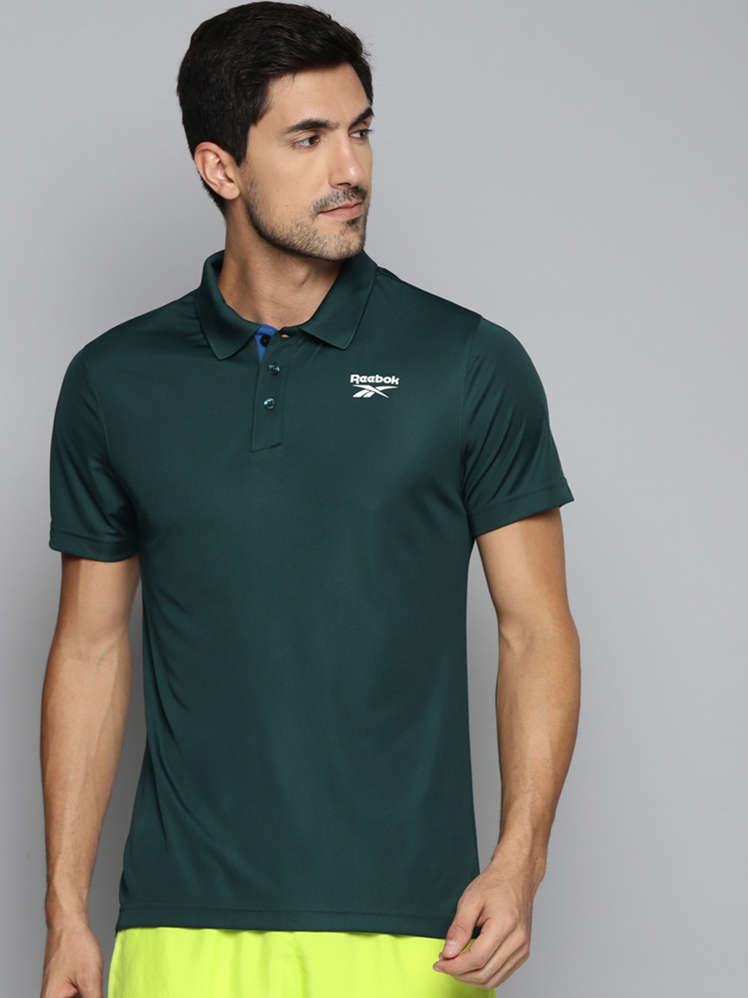 

Reebok Men Green FND Vector Solid Polo Collar Training T-shirt