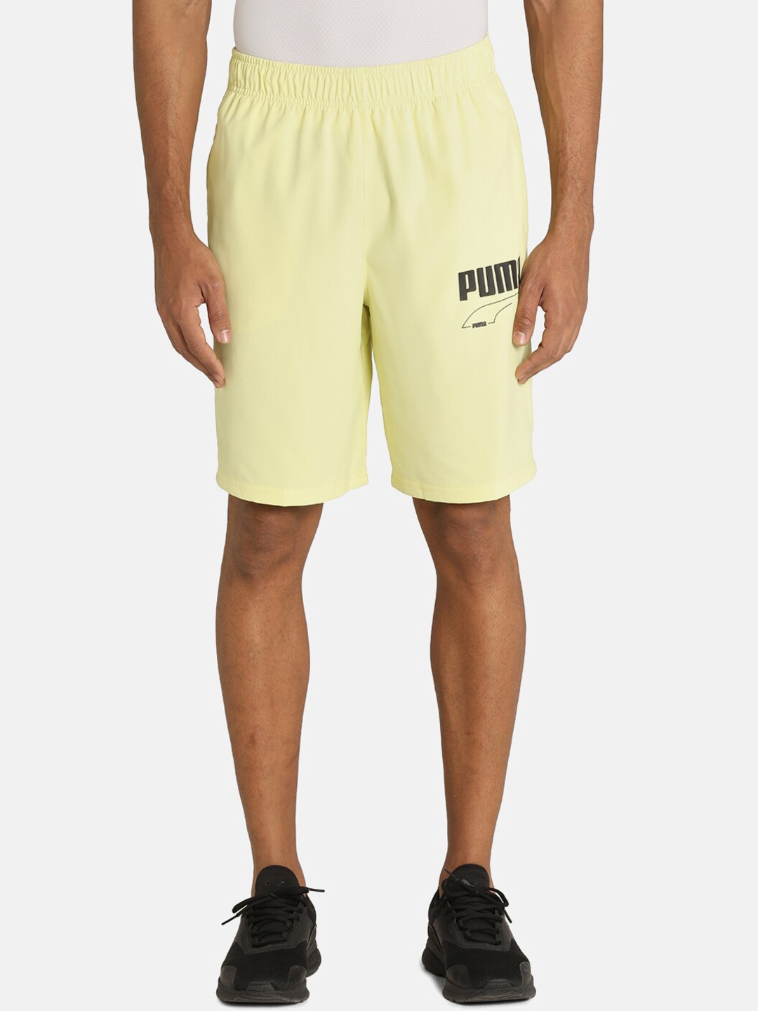 

Puma Men Yellow & Black Brand Logo Printed Sports Shorts