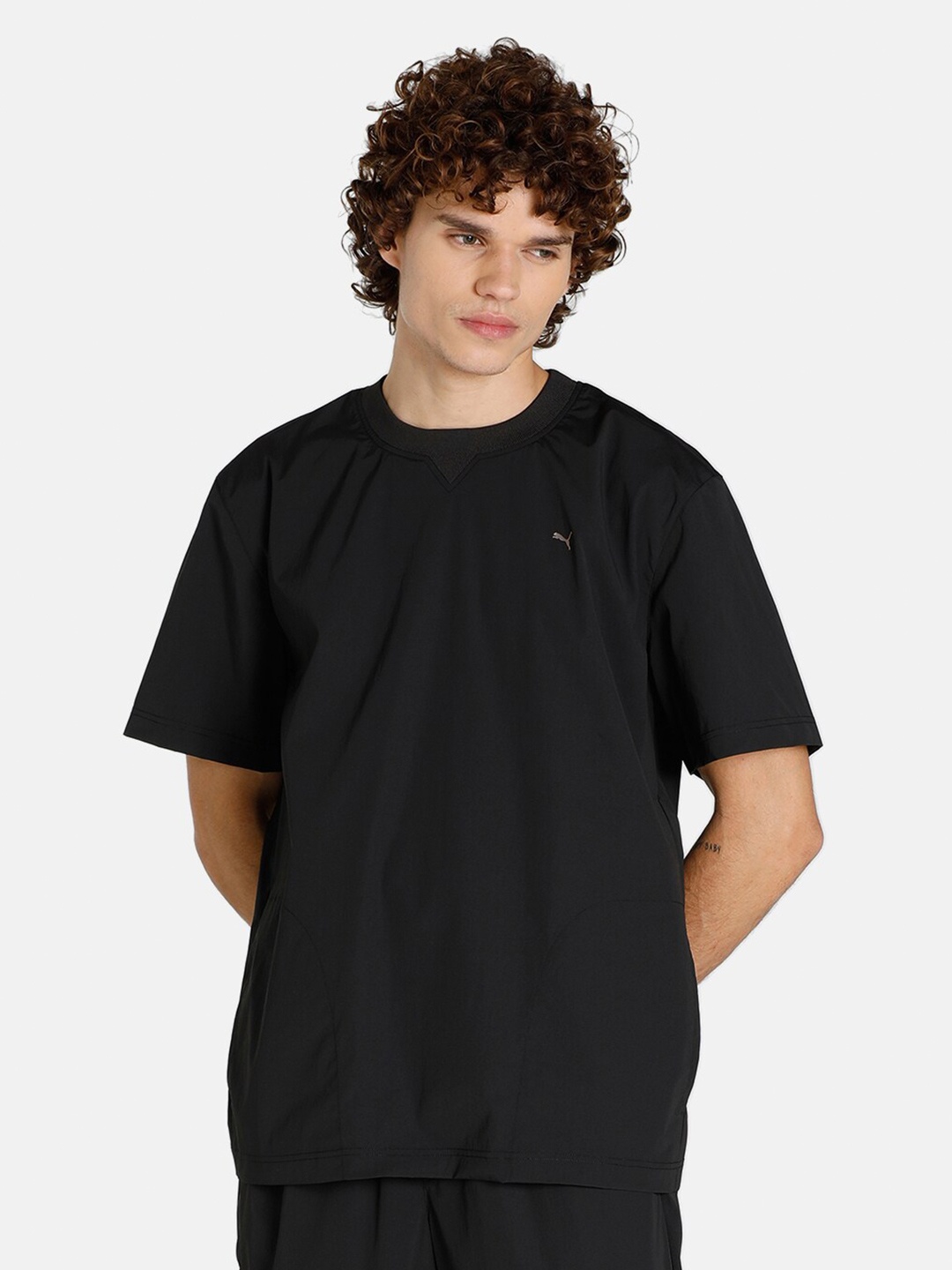 

Puma Men Black Solid Round Neck T-shirt