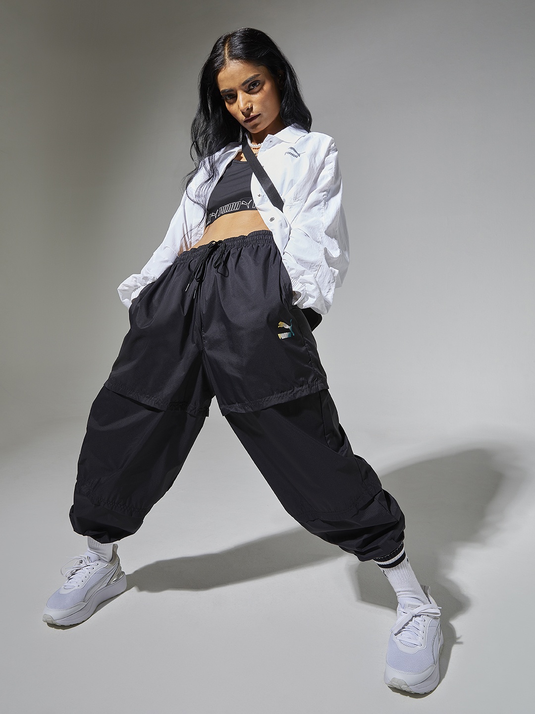 

Puma Woman Black Solid Crystal G. Woven Track Pants