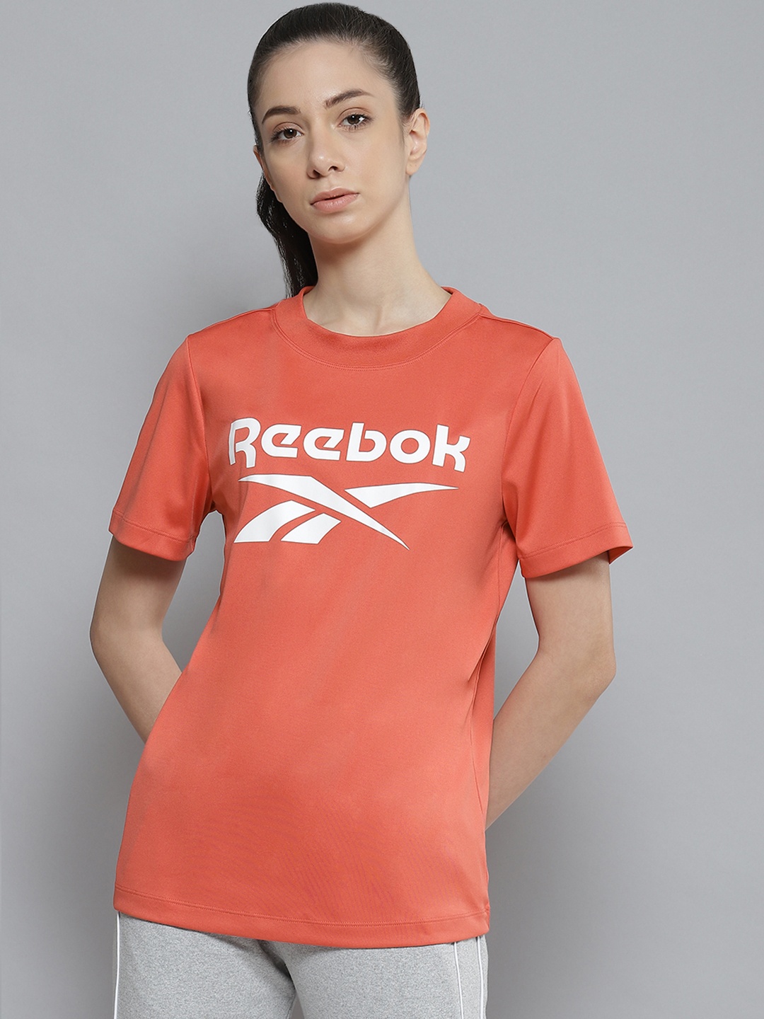 

Reebok Women Coral Red & White Store Staff Brand Logo Print Training T-shirt