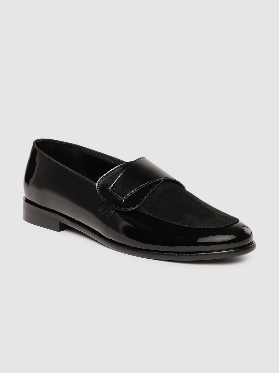 

The Alternate Men Black Solid Formal Slip On Shoes