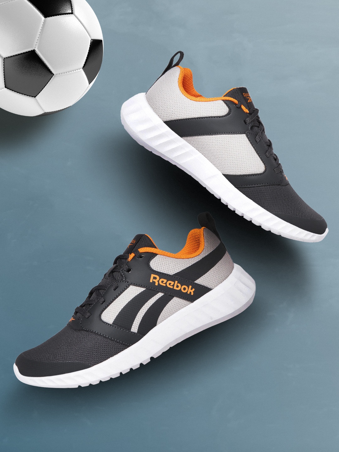 

Reebok Men Charcoal Grey & Off-White Striped Candler Running Shoes