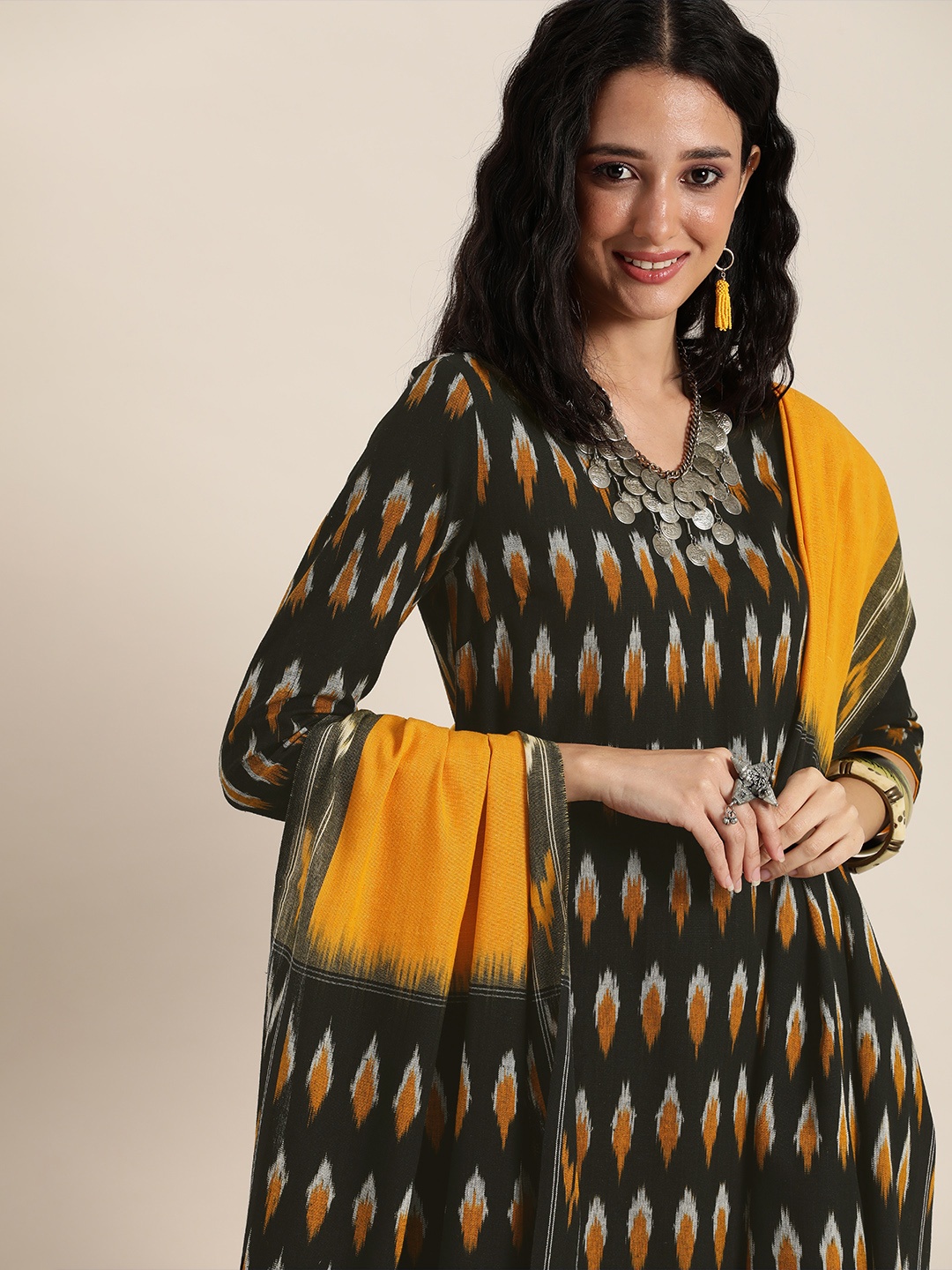 

Taavi Women Black Ikat Printed Kurta with Palazzos & With Dupatta