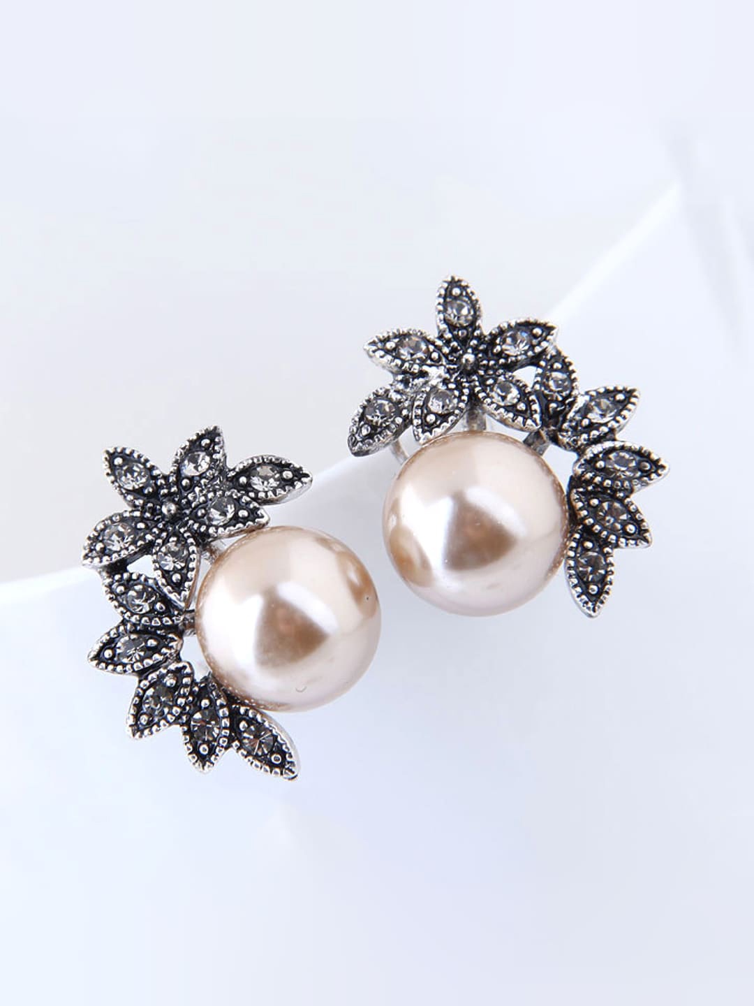 

Yellow Chimes White Silver-Plated Circular Studs Earrings