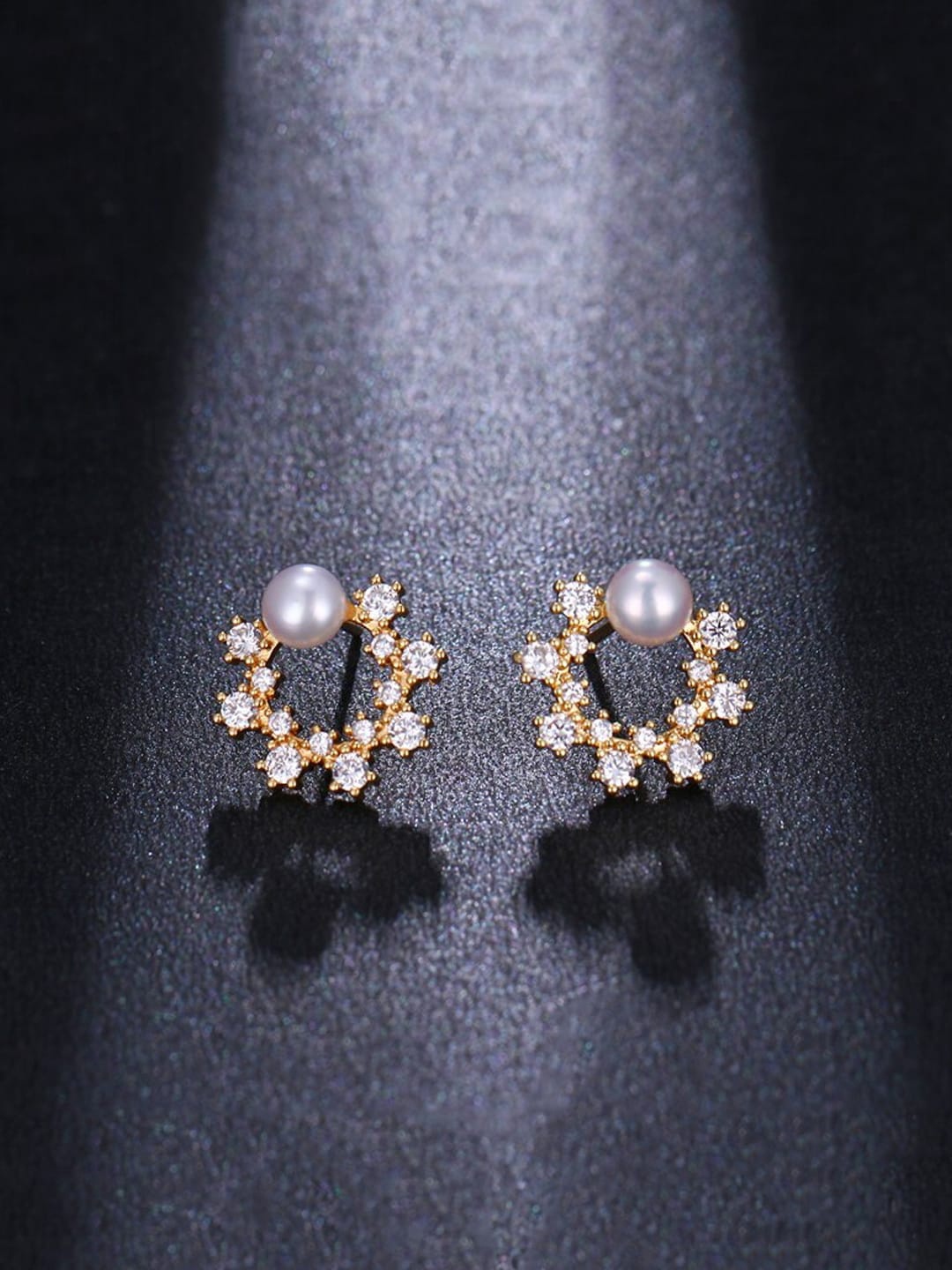 

Yellow Chimes Gold-Plated & White Crystal Pearl Studded Floral Studs Earrings