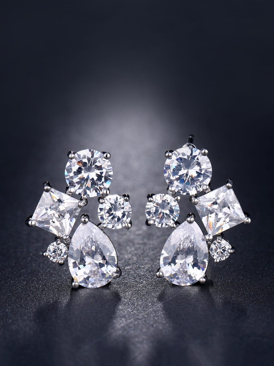 

Yellow Chimes Silver Toned White Crystal Stud Earrings