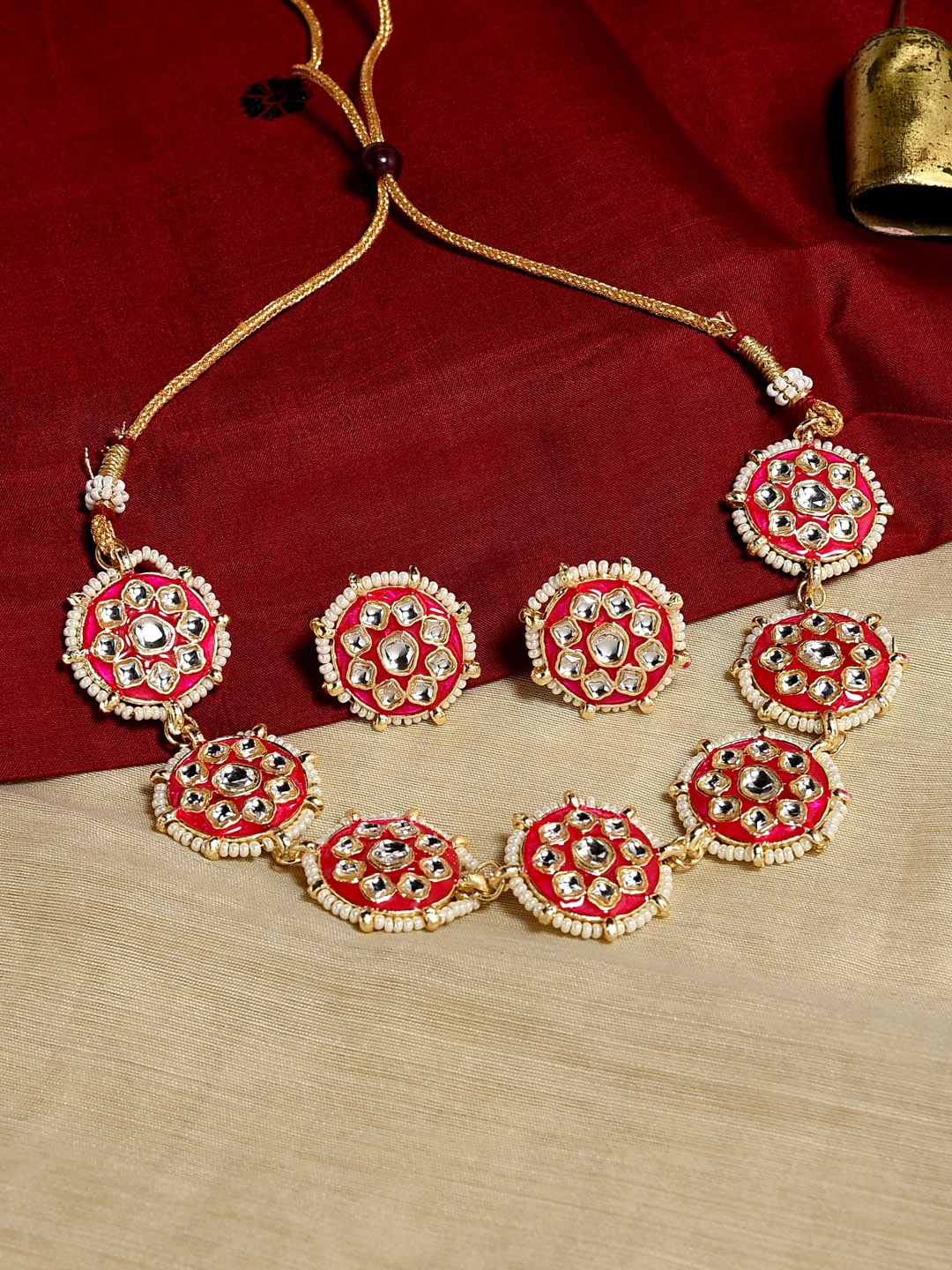 

Fida Women Gold Oxidised Silver Plated White Stone Studded Jewellery Set