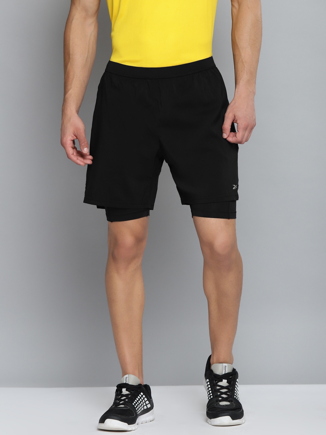 

Reebok Men Black Slim Fit Sports Shorts