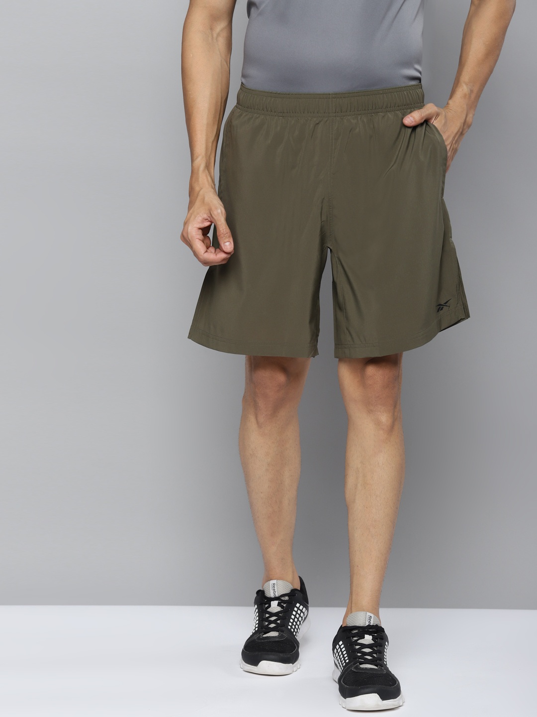 

Reebok Men Olive Green Solid Austin Training Shorts