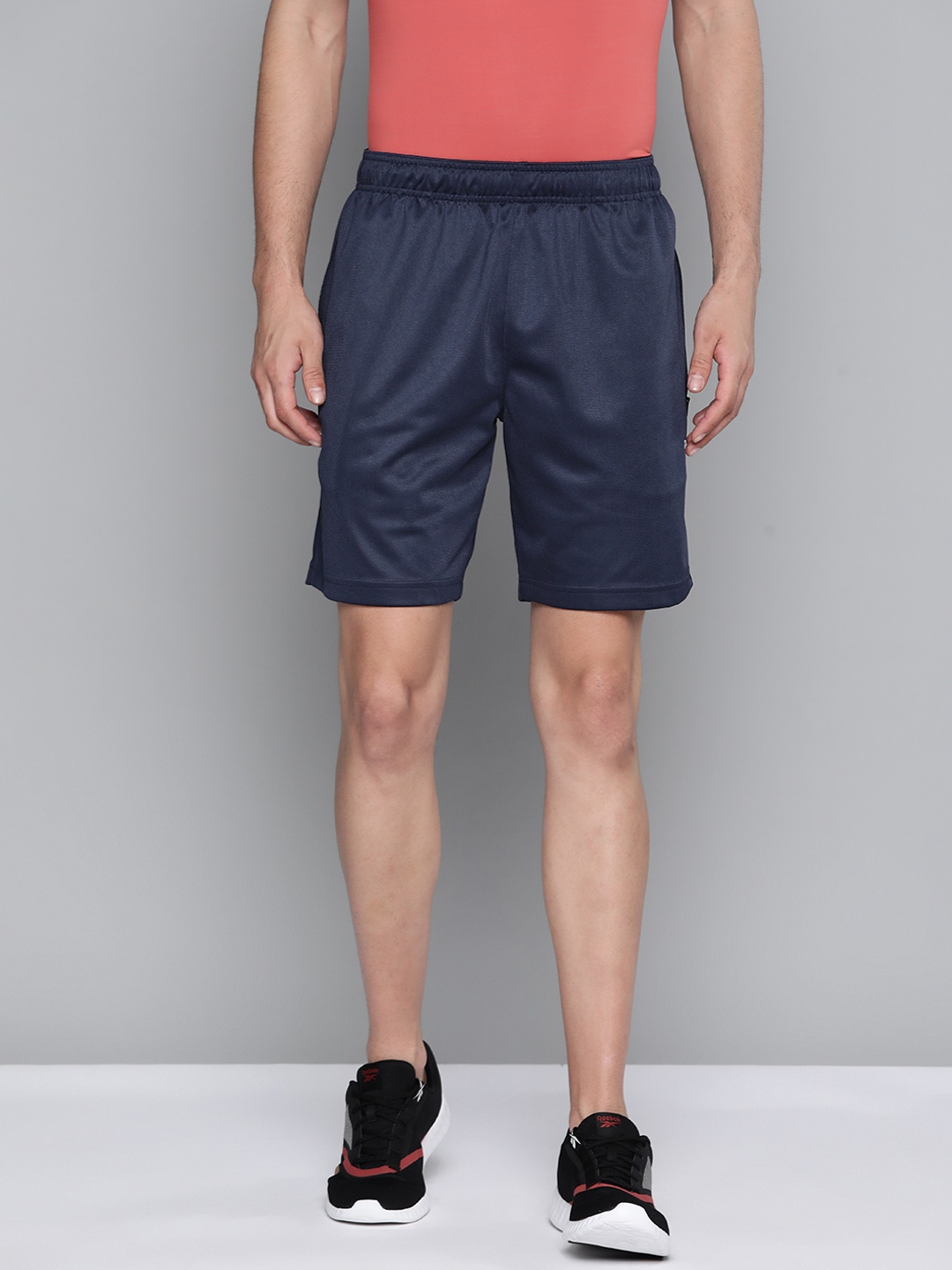 

Reebok Men Navy Blue Solid Speedwick Training Sports Shorts