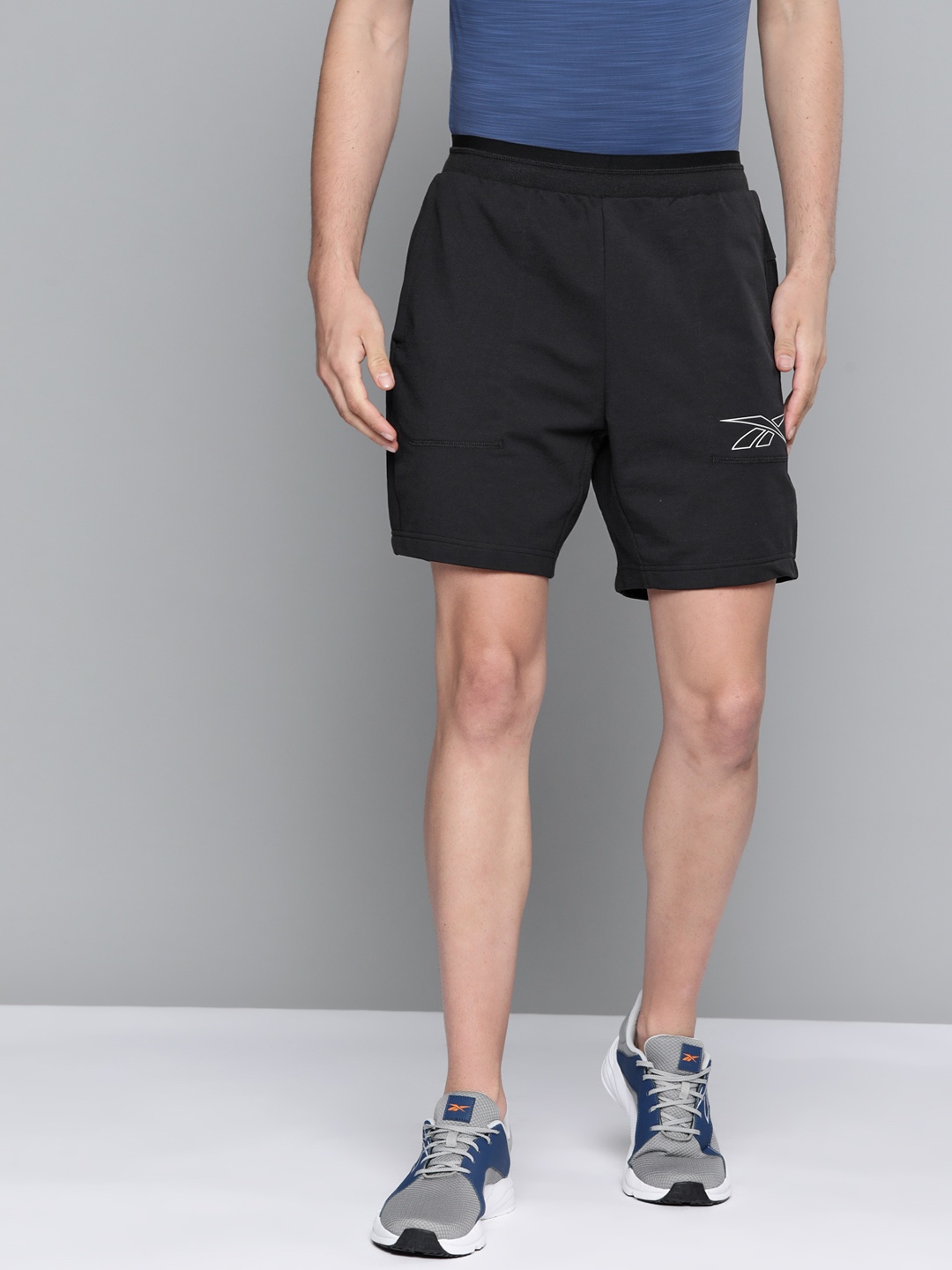 

Reebok Men Black Solid Training Sports Shorts