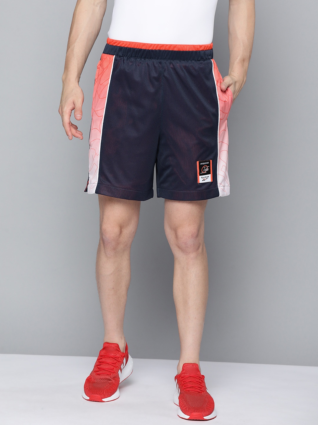 

Reebok Classic Men Navy Blue Colourblocked TS BBall Sports Shorts