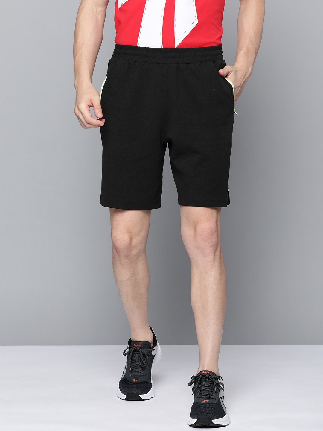 

Reebok Men Black Solid Workout Shorts