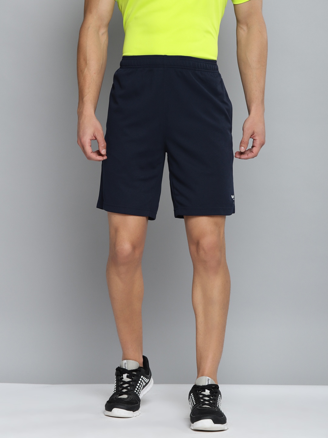 

Reebok Men Navy Blue Solid Perforated Training WF Sports Shorts